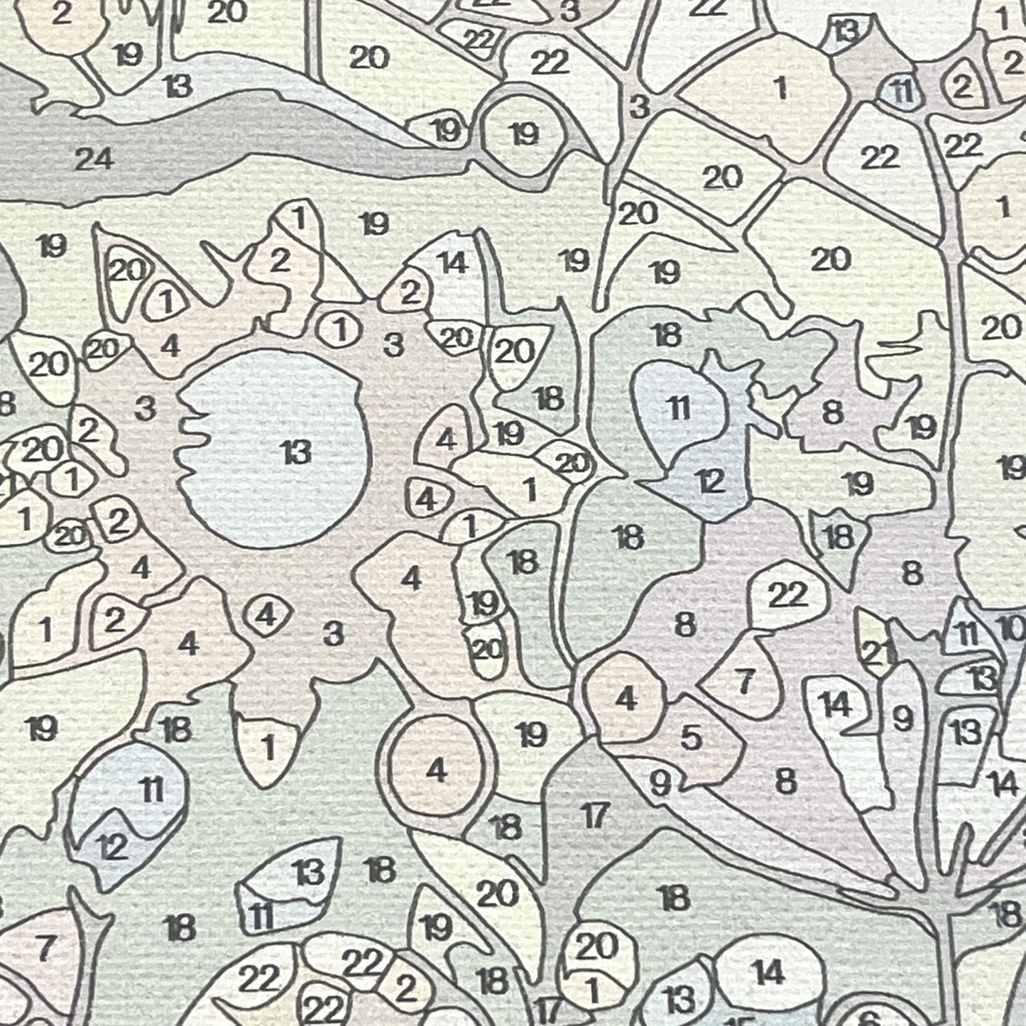 Close up of canvas with numbered and lightly colored areas