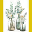 A painting kit with three glass bottles of different sizes on a canvas, with eucalyptus leaves and other small flowers arranged inside the bottles.