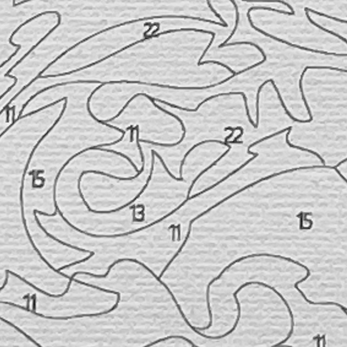 Closeup of paint by number canvas showing canvas texture and numbers