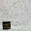 Closeup of paint by number canvas showing canvas texture and numbers with "refererence sheet included" sign.