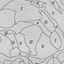Closeup of paint by number canvas showing canvas texture and numbers