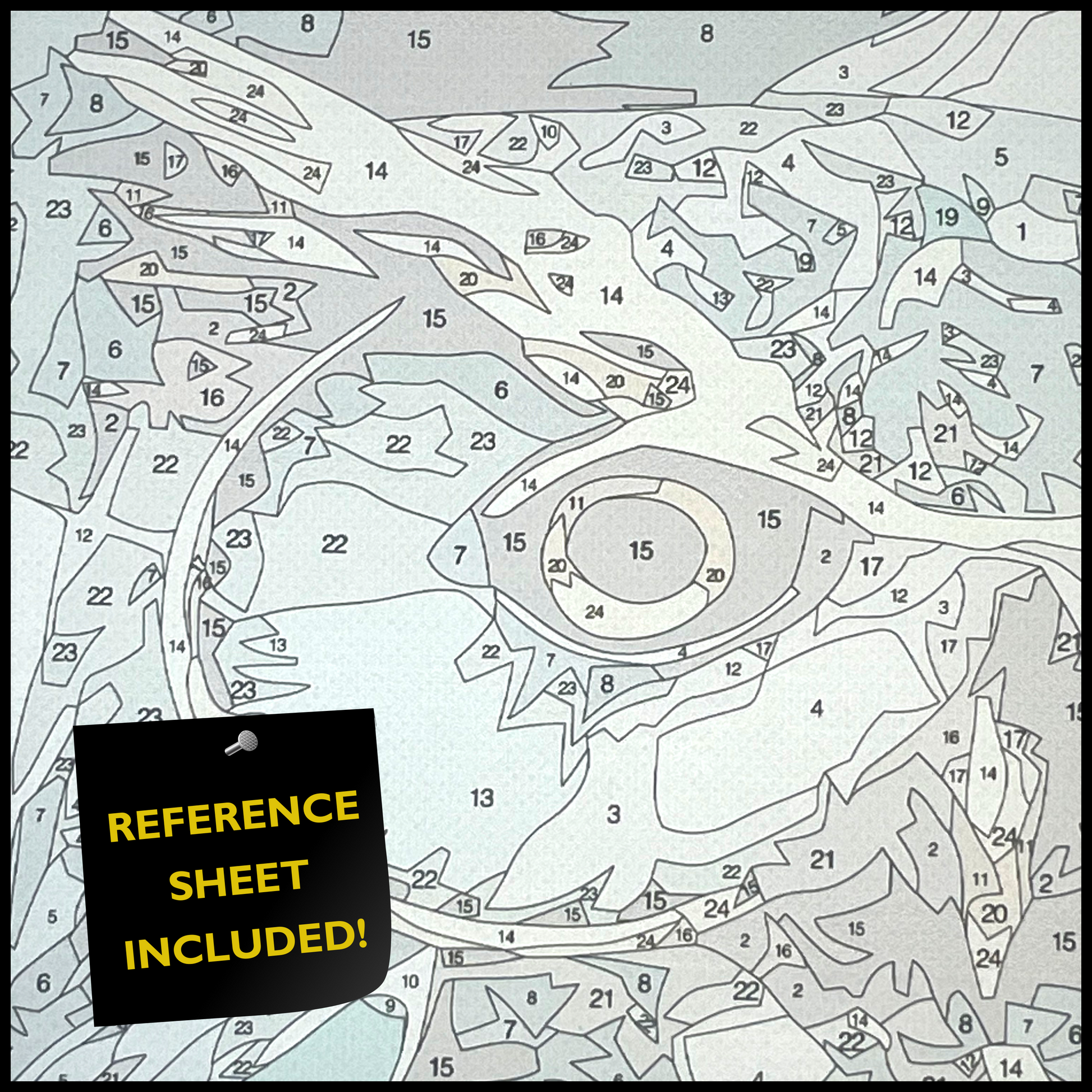 Close up of canvas showing numbered areas to paint and "reference sheet included"