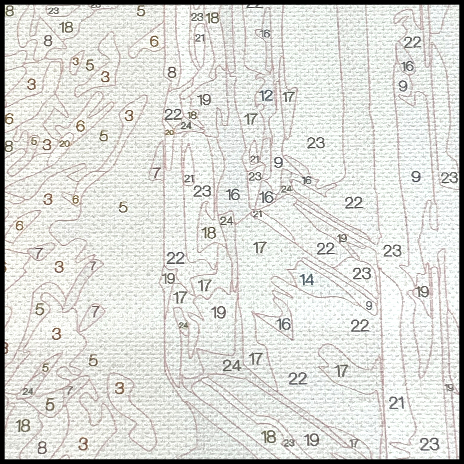 Close up of canvas showing numbered areas to paint