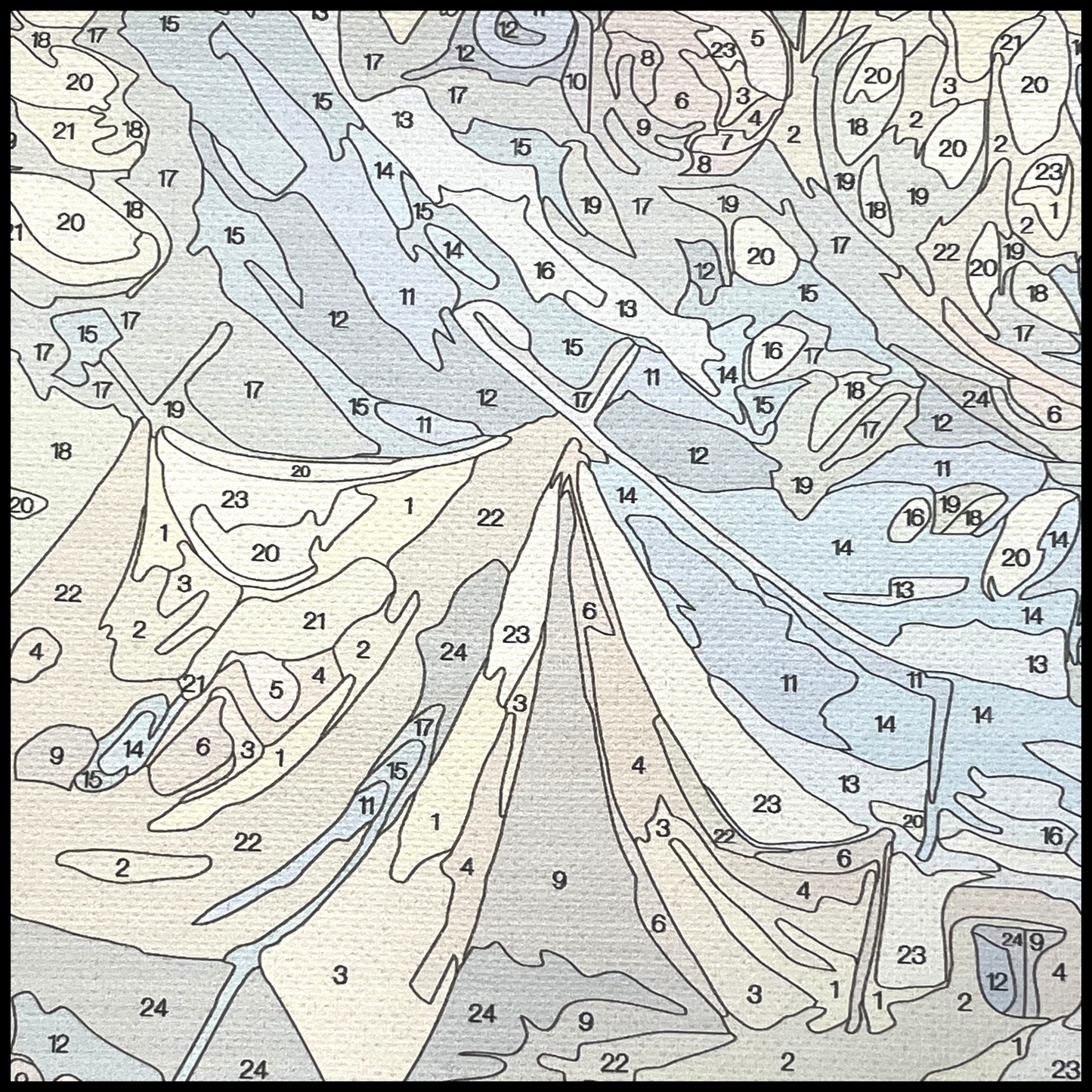 Close up of canvas showing numbered areas to paint