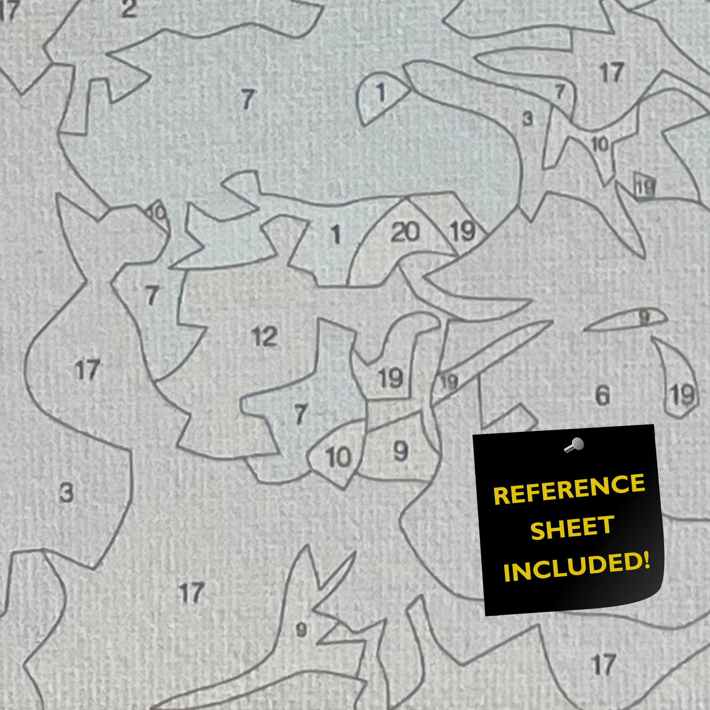 Closeup of paint by number canvas showing canvas texture and numbers with "refererence sheet included" sign.
