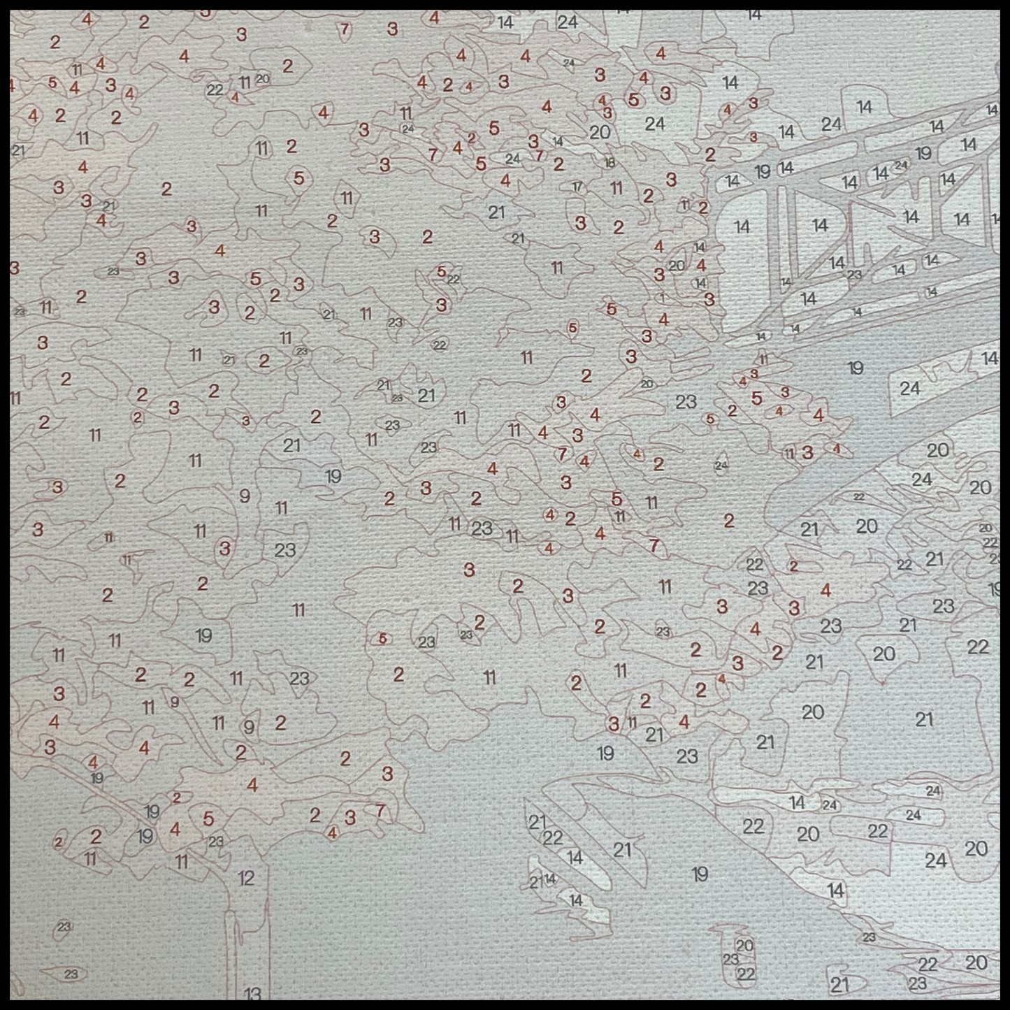 Close up of canvas showing numbered areas to paint