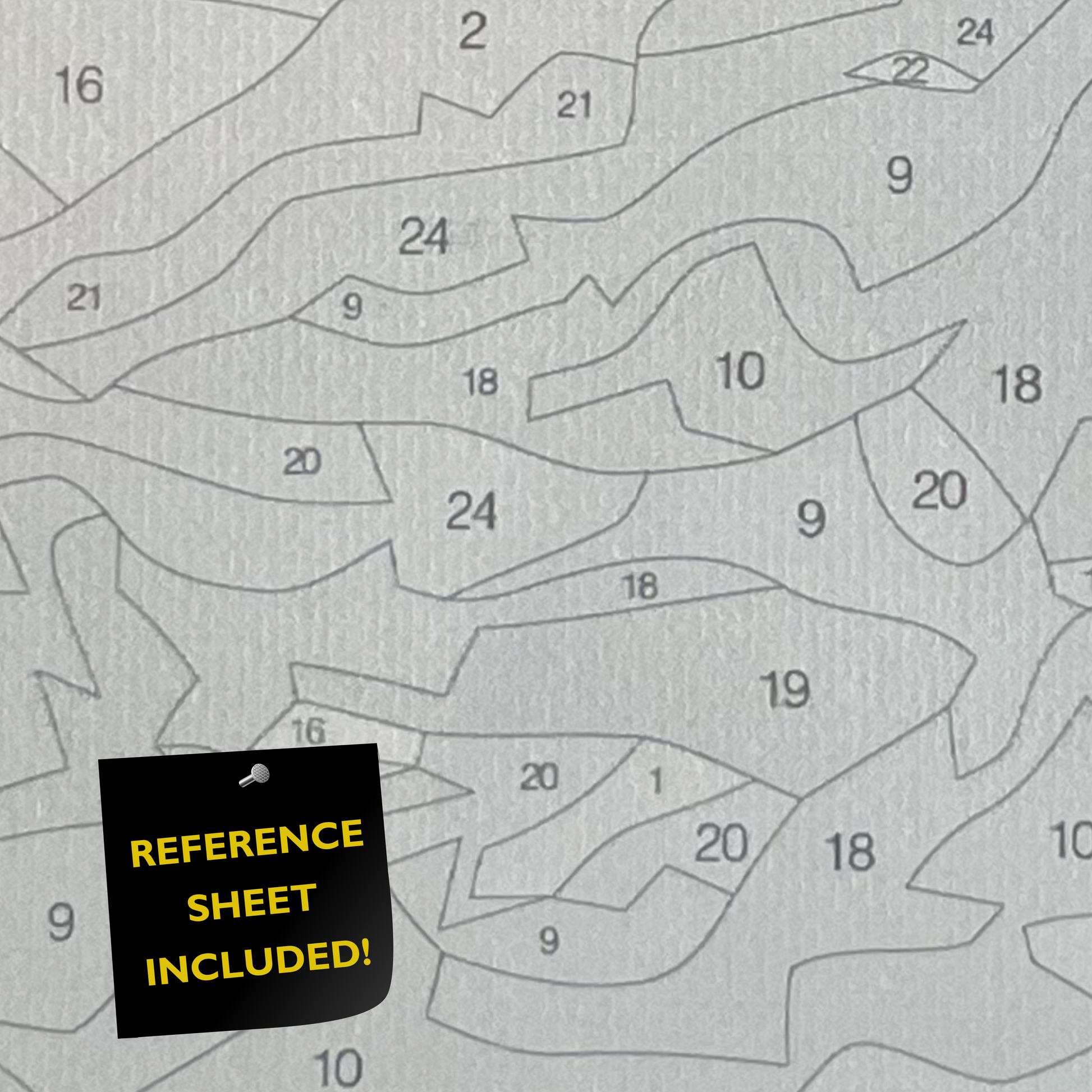 Closeup of paint by number canvas showing canvas texture and numbers with "refererence sheet included" sign.