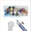 Set f acrylic paints, paint brushes, and a magnifying glass on a white background.