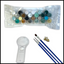 Set of paint colors with a magnifying glass and brushes on a white background