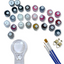 Set of small containers with paint colors and painting tools on a white background