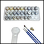 Set of paints with a magnifying glass and brushes on a white background